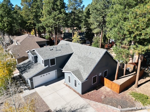 replacing shingles on flagstaff roofs